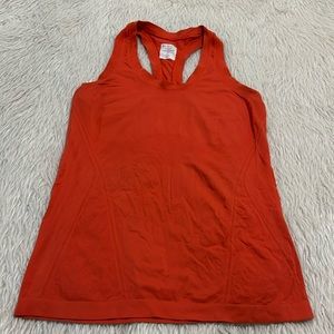 Athleta orange compression razor back yoga fitness tank top sizes small